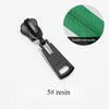 Black resin zipper slider with a green fabric detail for tooth profile compatibility