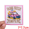 Pink embroidered patch featuring a vintage pink car and the text Farm Fresh Pumpkins