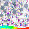 A collection of iridescent crystal AB flatback rhinestones in various shades and sizes.
