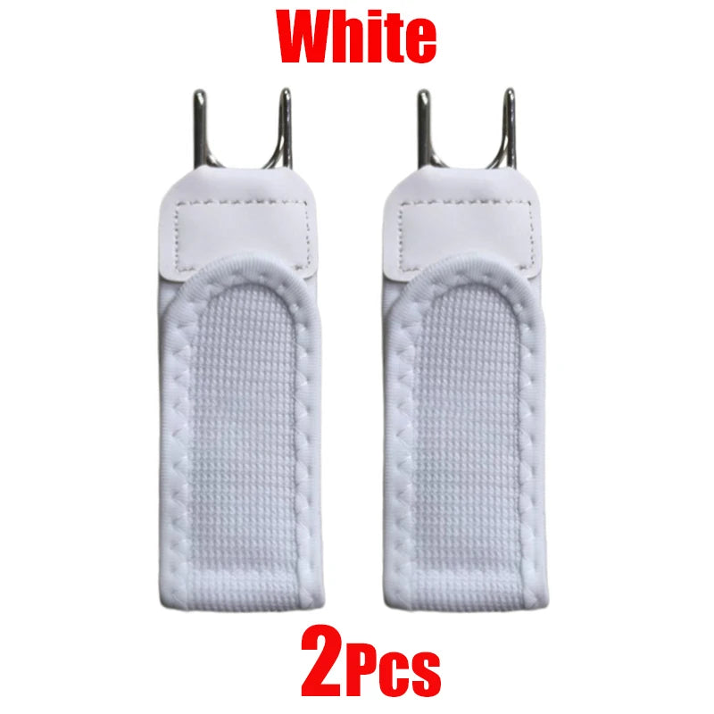 Two white adjustable buckle-free elastic belts with padded grips