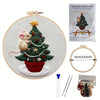 Embroidery DIY kit featuring a festive Christmas tree decorated with ornaments and a squirrel, presented on a circular wooden