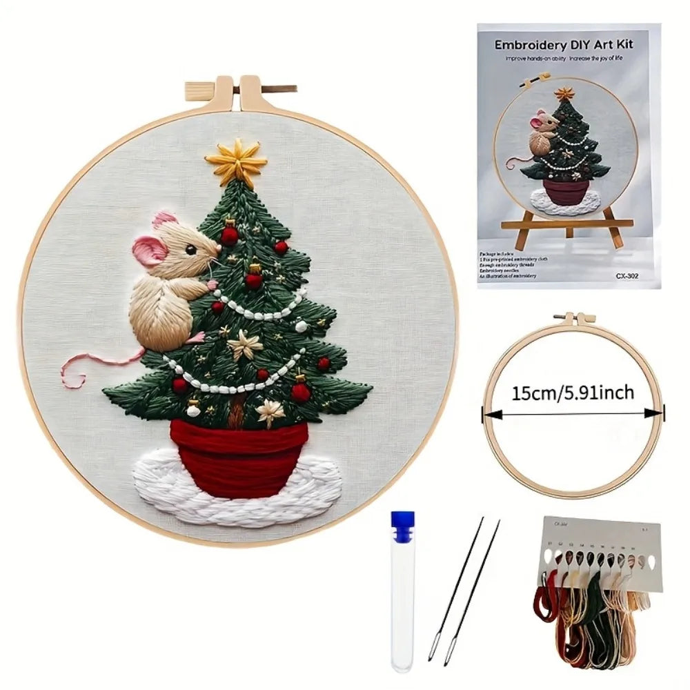 Embroidery DIY kit featuring a festive Christmas tree decorated with ornaments and a squirrel, presented on a circular wooden