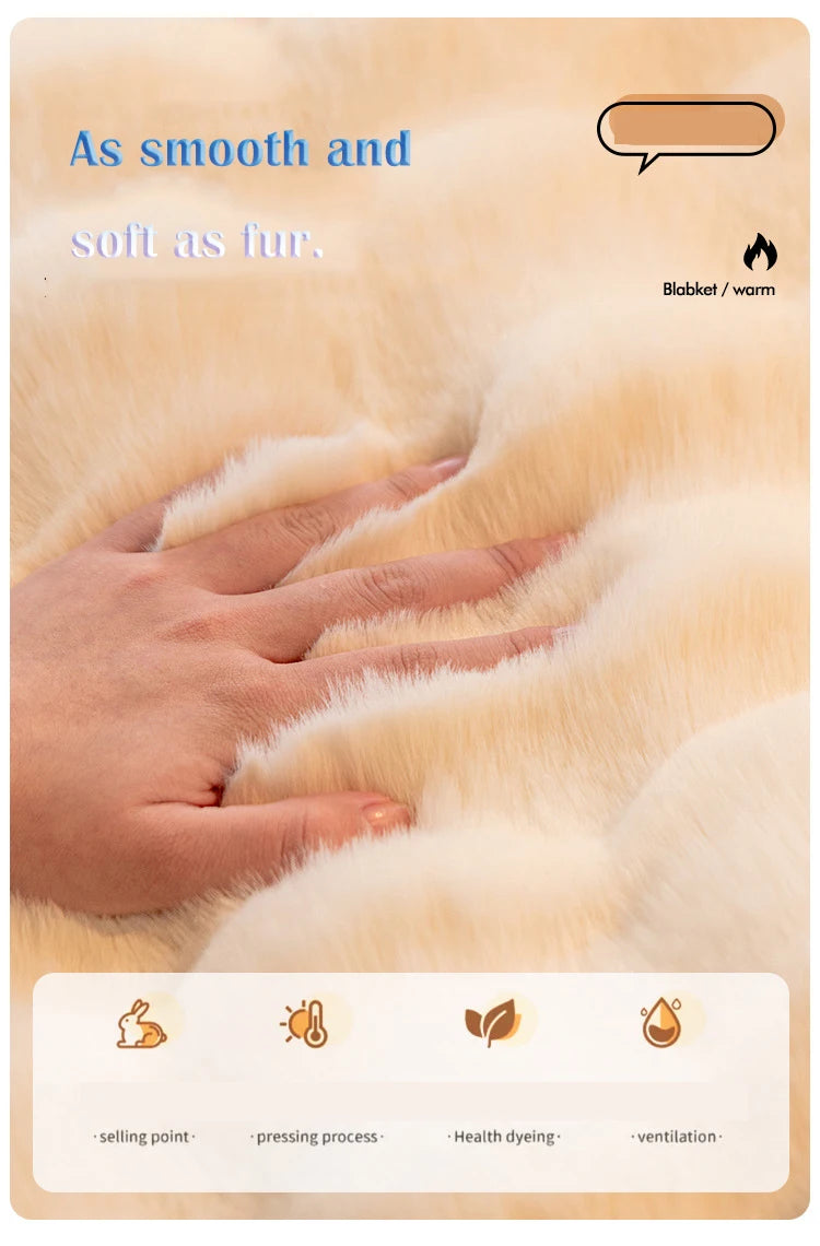 A hand gently touches a fluffy, light yellow-cream velvet fabric, highlighting its smooth and soft texture.