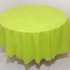 A round lime green plastic disposable table cover spread on a white surface.