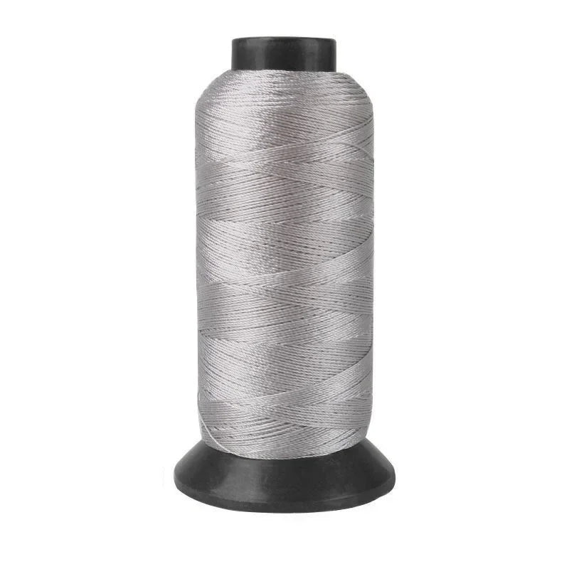 Roll of heavy duty 3-ply nylon sewing thread with a black core.
