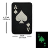 Black embroidered patch featuring a large spade symbol, a small club, and a diamond.