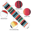 A vibrant Mexican serape table runner featuring multicolored stripes, manual tassels, and fine workmanship.