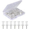 A clear plastic container holding numerous push pins with steel tips.