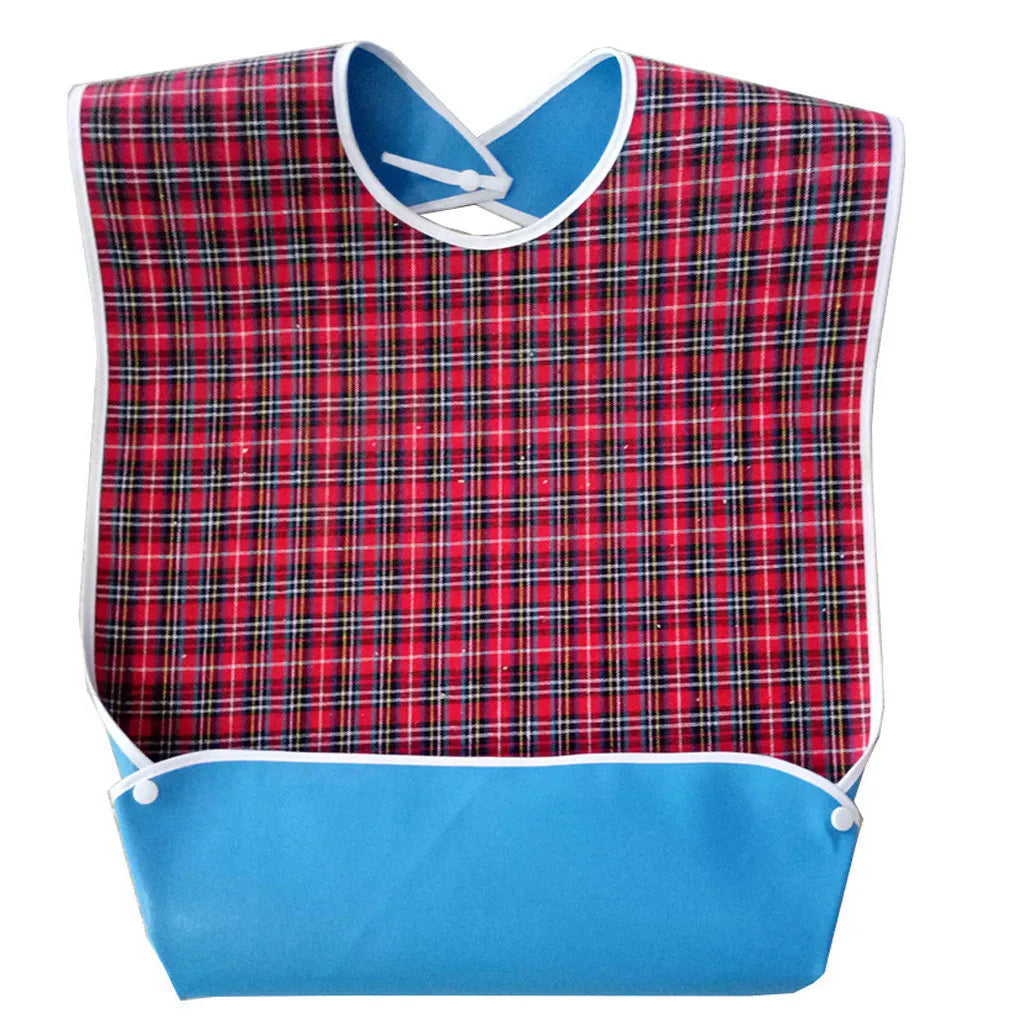 A red and black plaid waterproof mealtime bib with a blue trim and adjustable neck.