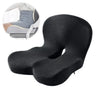A black ergonomic memory foam car seat cushion shown next to a folded white and gray cushion.