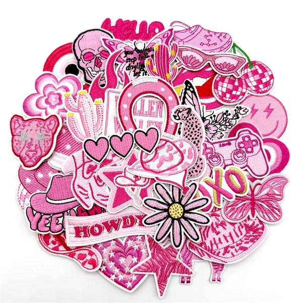 A collection of pink embroidered applique patches featuring various shapes and designs for DIY decoration.