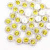 Silver and yellow crystal rhinestone sew-on buttons arranged in a floral pattern