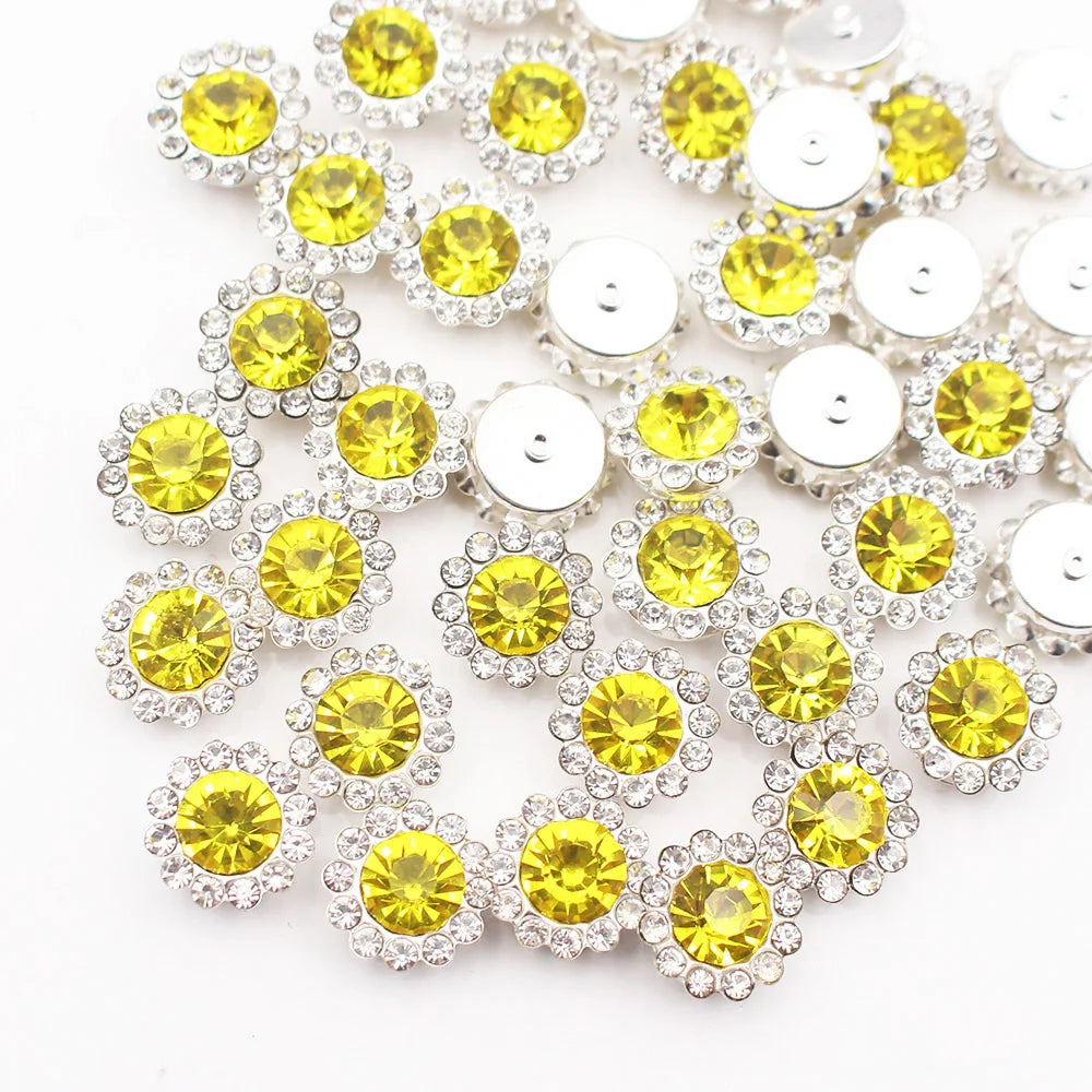 Silver and yellow crystal rhinestone sew-on buttons arranged in a floral pattern