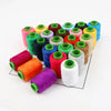 A collection of 24 hand-dyed sewing threads in various shades of green, yellow, pink, purple, and brown.
