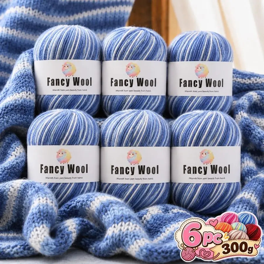 A set of three balls of blue gradient alpaca wool yarn labeled Fancy Wool for knitting and crochet projects.