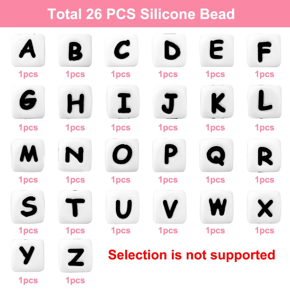 A set of 26 silicone alphabet beads in black and white letters arranged in a grid.