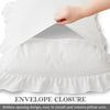 A hand is opening a white pillow cover to reveal the ruffled envelope closure design.