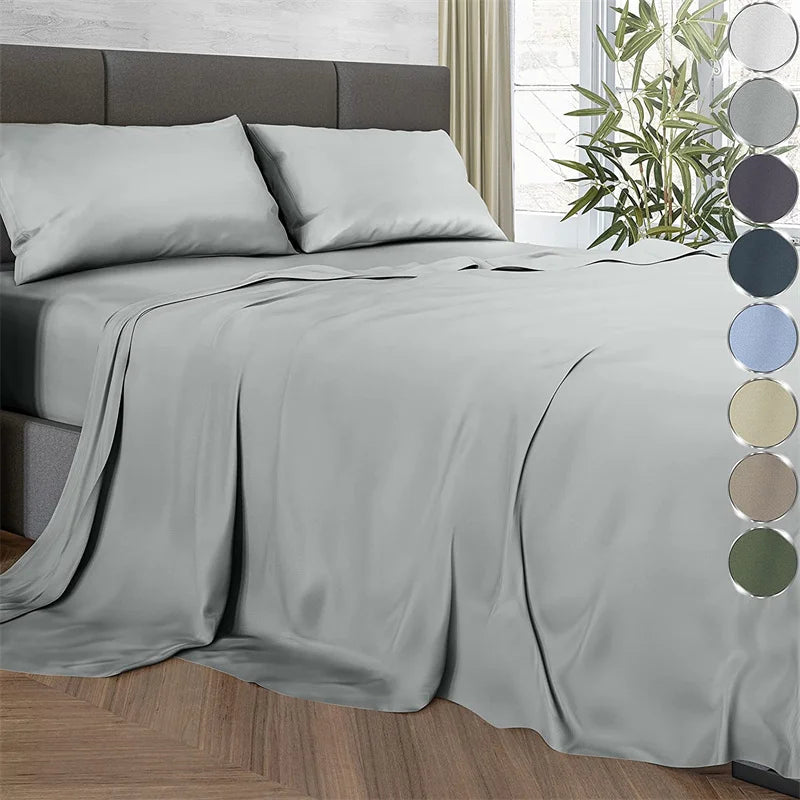 A luxury bamboo bedding set featuring a smooth gray duvet and pillows on a bed.