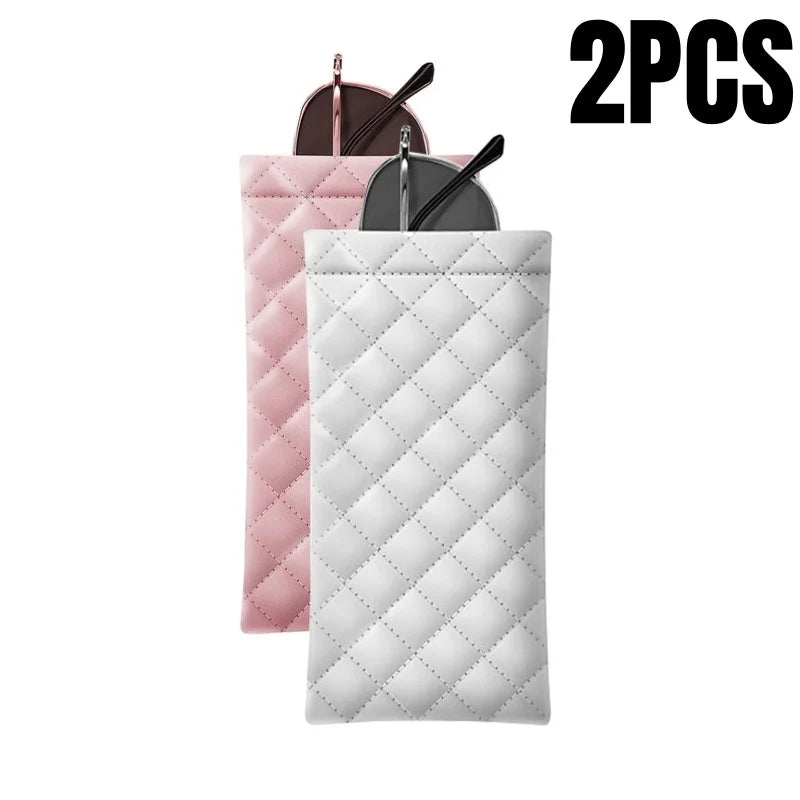 Two pink and white quilted PU leather eyeglass cases with cleaning cloths