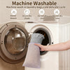 A hand is holding a gray waffle design non-slip bathroom mat near the door of a white washing machine.