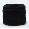 A ball of black soft chenille knitting yarn for hand crafting