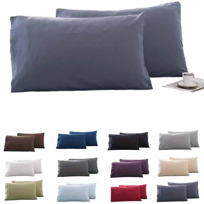 A set of two soft gray polyester pillow covers shown side by side.