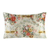 A square silk pillowcase featuring a delicate floral print in shades of pink, red, and green on a cream background.