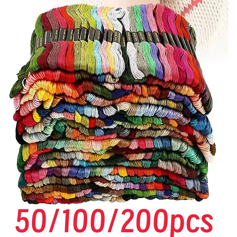A stack of premium multicolor embroidery floss threads in various colors and shades for crafting.