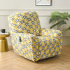 A yellow and gray patterned floral print recliner chair sitting on a wooden floor.