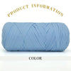 A skein of light blue thick polyester blended yarn is shown rolled up for crafting.