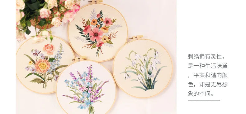 A collection of five embroidery designs featuring floral patterns on light cream fabric.