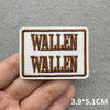 Two embroidered iron-on patches featuring the text WALLEN repeated in a rustic brown and white stitch pattern