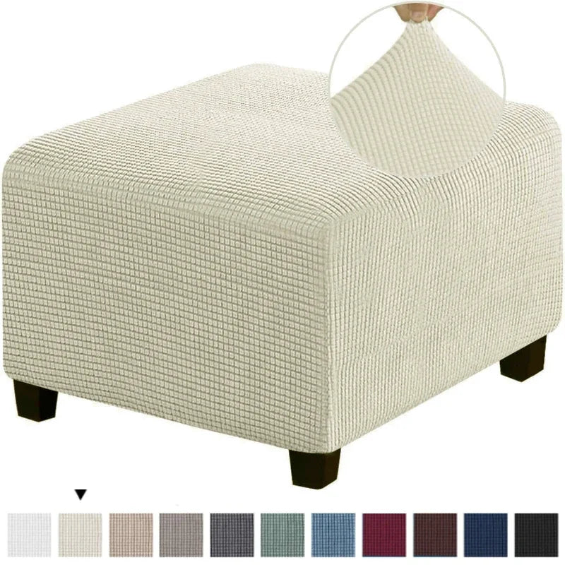 A square jacquard footrest ottoman slipcover in a light beige color with a woven texture.