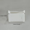 White hinge-type fabric sewing guide with a measuring scale showing dimensions of 3.3cm by 5.9cm
