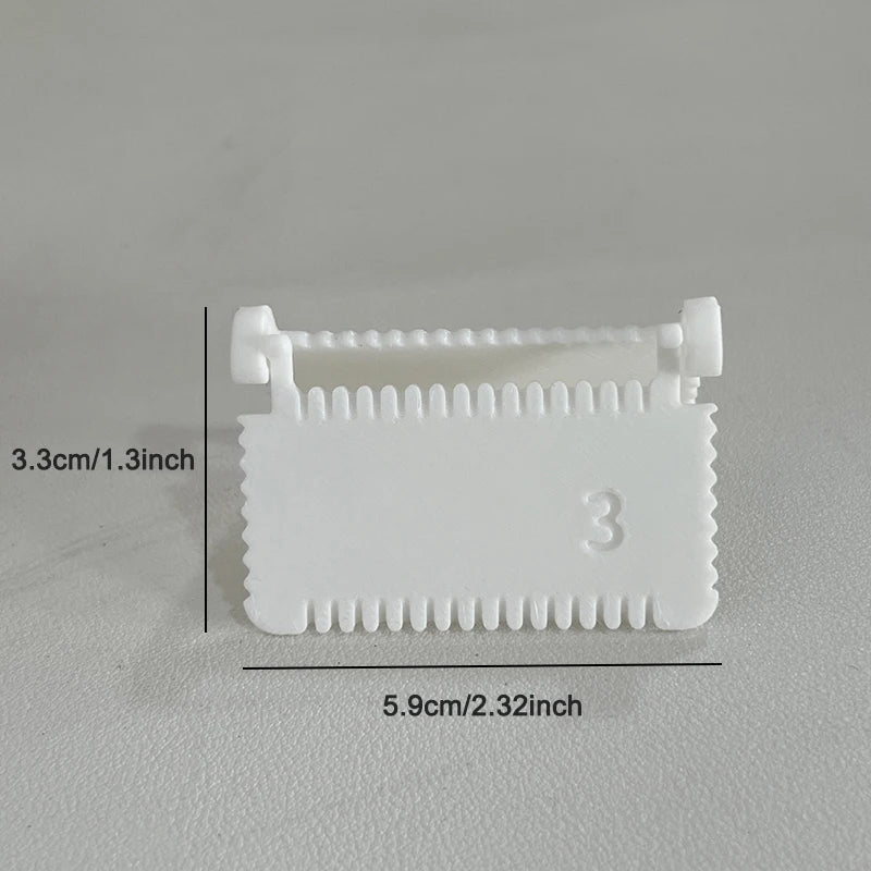 White hinge-type fabric sewing guide with a measuring scale showing dimensions of 3.3cm by 5.9cm