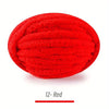 A ball of bright red, extra thick hand-knitted yarn for crafting and gifts.