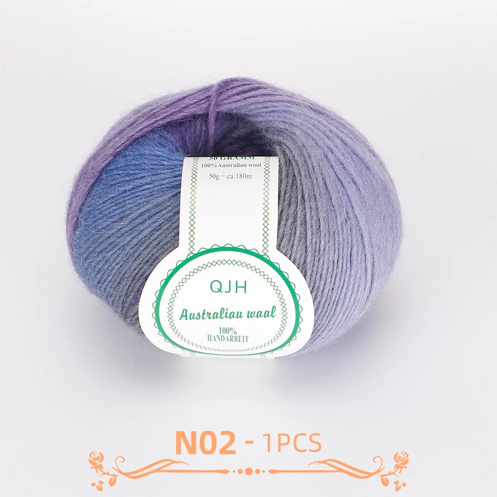 A ball of purple and blue multi-colored wool yarn for knitting and crocheting