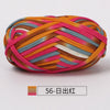 A ball of hand-dyed fabric strip yarn featuring stripes of orange, pink, and blue.