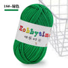A ball of bright green thick polyester craft yarn for knitting and crochet