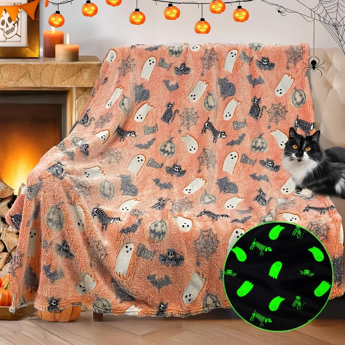 A coral fleece blanket featuring a spooky, gray and orange pattern with white ghost and animal motifs.