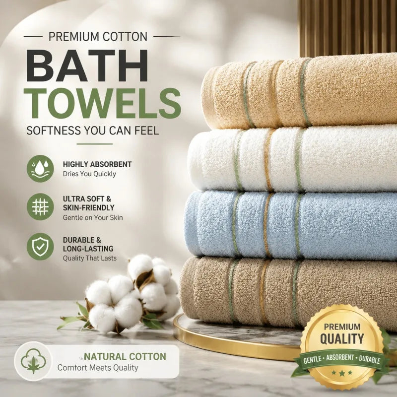 Stack of premium cotton bath towels in beige and light blue colors with natural cotton elements.