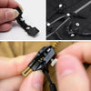 A close-up of a black zipper repair kit showing replacement heads and tools being used on a garment.