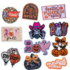 A collection of pumpkin themed iron-on patches featuring spooky designs and fall vibes.