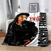 A black and white retro printed flannel throw blanket featuring a portrait of a person.