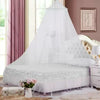 White mesh mosquito net draped over a bed for home decor