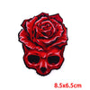 A red rose skull embroidery patch featuring a detailed floral design on a skull shape.