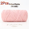 Two pink reusable elastic yarn skeins displayed for crafting