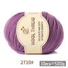Purple wool thread skein with a label indicating 2710# and 10pcs=500g