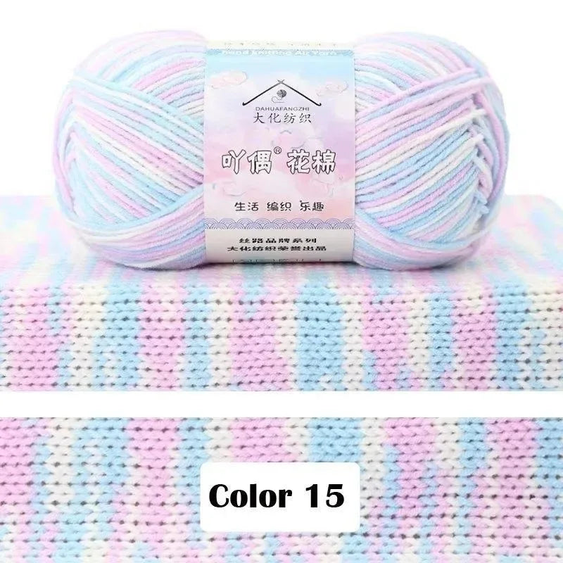 A ball of light blue and pink gradient yarn labeled as 4-Ply Cotton Knit Yarn for Gradient Projects