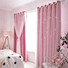 Pink sheer curtains with sparkling accents hanging in a bright bedroom window.